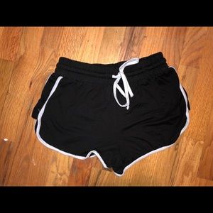 Black dolphin ringer shorts